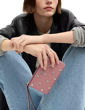 Coach Corner Zip Wristlet With Heart Rivets | Brixton Baker