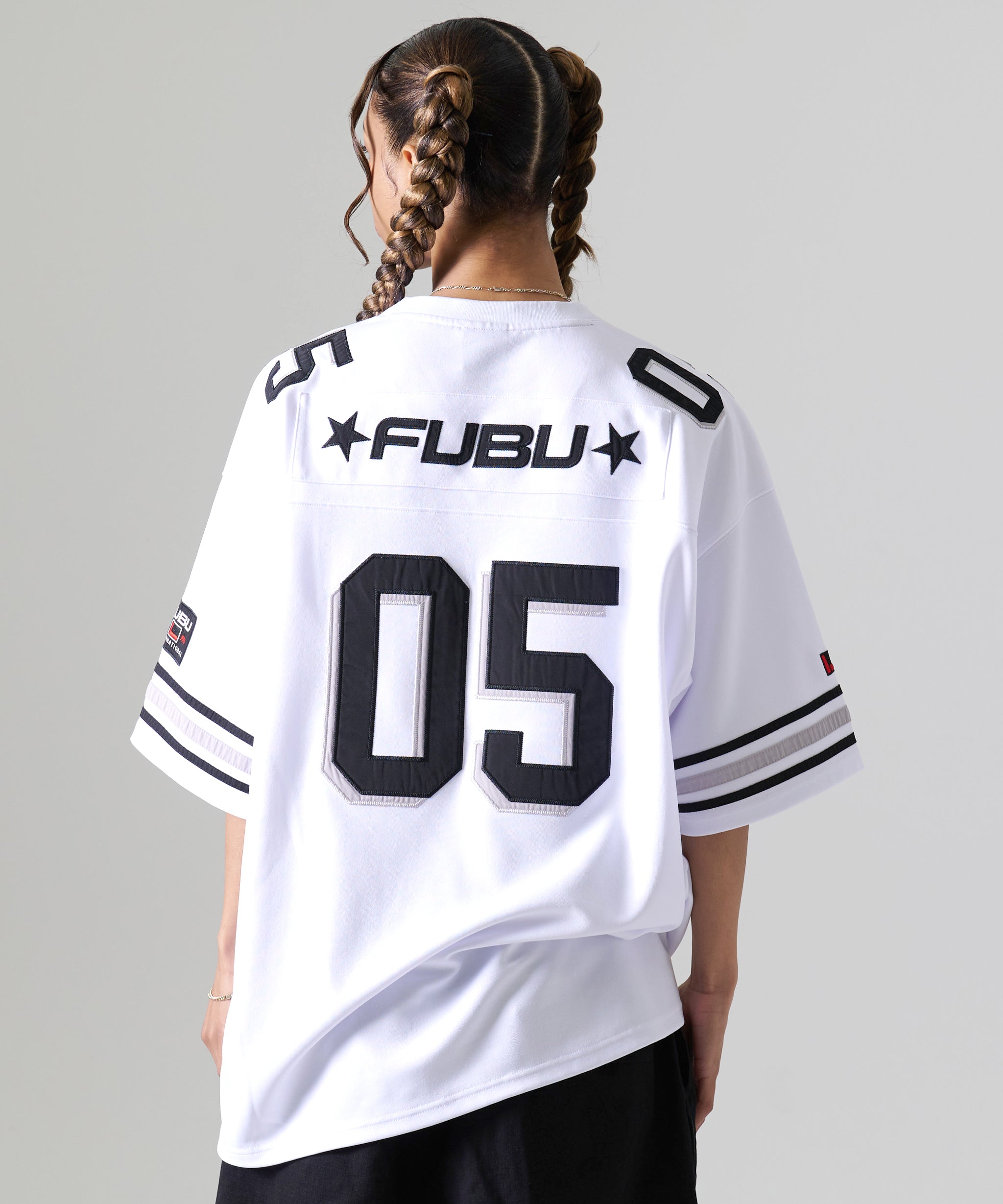 FUBU フブ トップス ブランド ロゴ フットボール ゲームシャツ。FUBUは