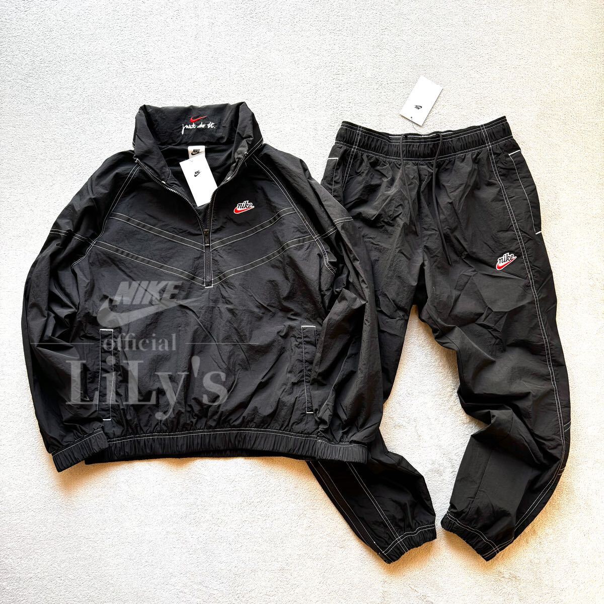 新品未使用 NIKE上下セットアップ Lサイズ 黒赤 ナイキ スウォッシュ