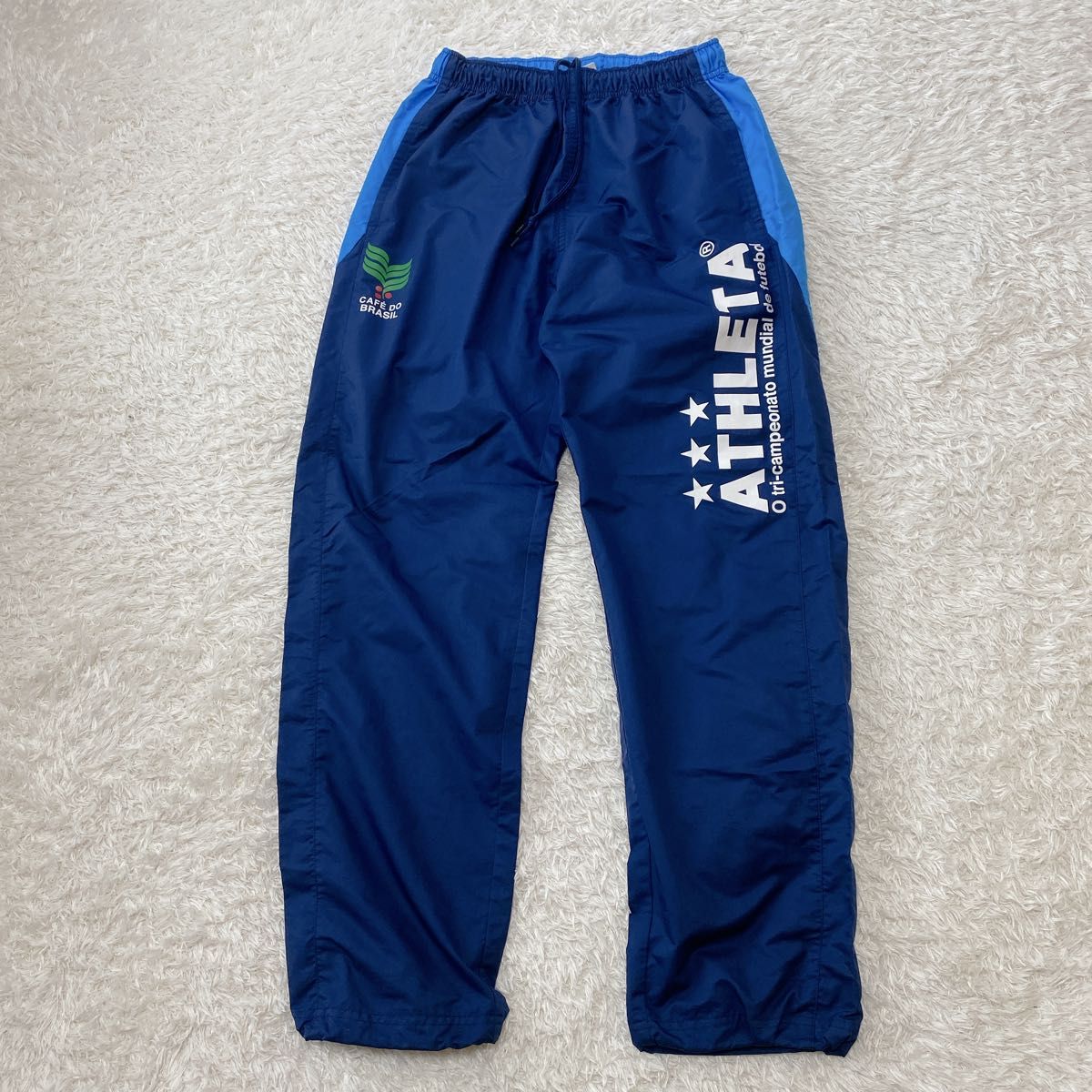 未使用級／ATHLETA ピステ セットアップ Mサイズ 紺色 上下 フットサル