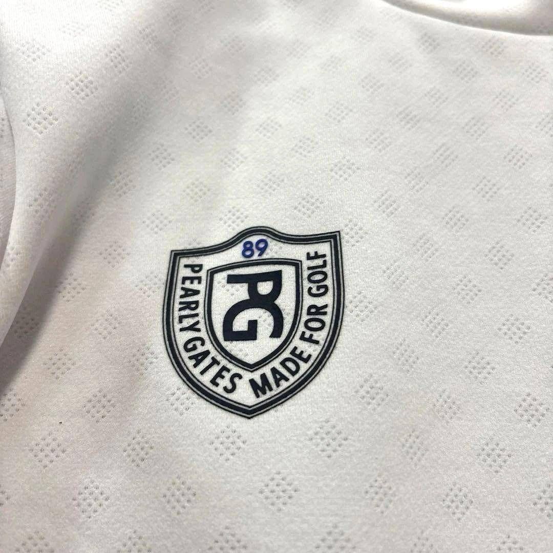 パーリーゲイツ 長袖 モックネックシャツ ホワイト 総柄 ロゴ 0/S