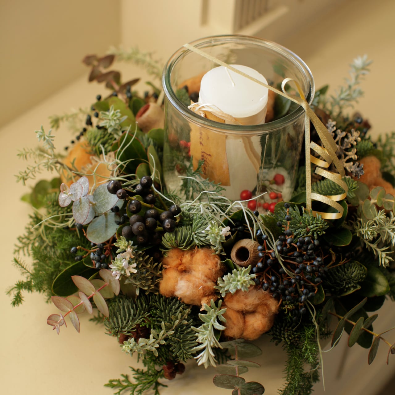 クリスマスキャンドルアレンジメント | フラワーショップ Bremen
