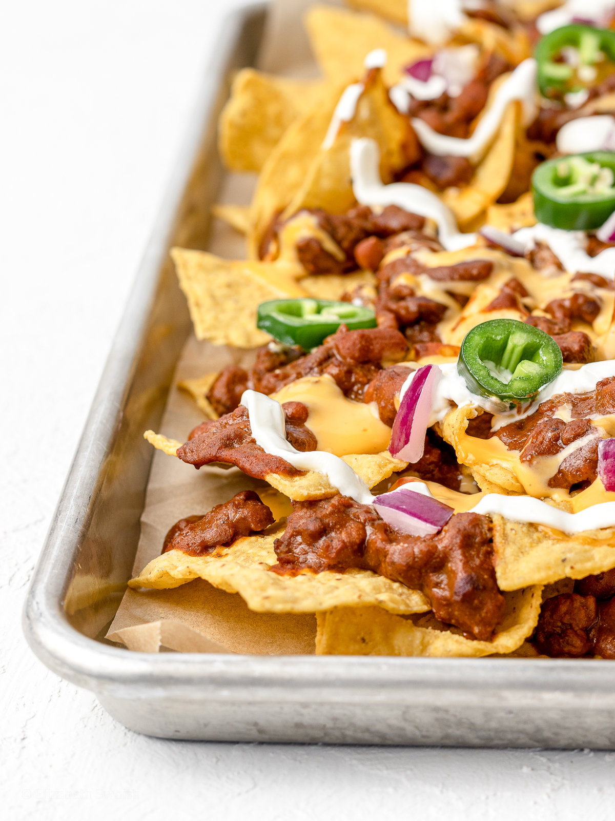 Chili Cheese Nachos - Easy and Cheesy - Entirely Elizabeth