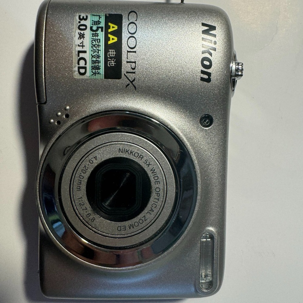 Nikon COOLPIX L25 Digital Camera 10.1 MP 5x Optical Zoom English