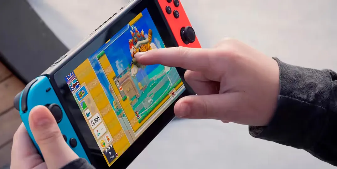 Игровая приставка Nintendo Switch with Neon Blue and Neon Red Joy