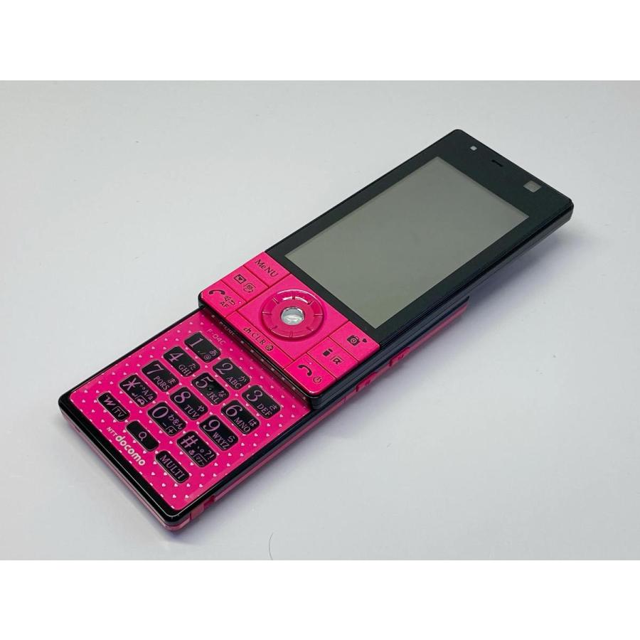 富士通（FUJITSU） docomo F-04C 小悪魔PINK ピンク 白ロム スライド