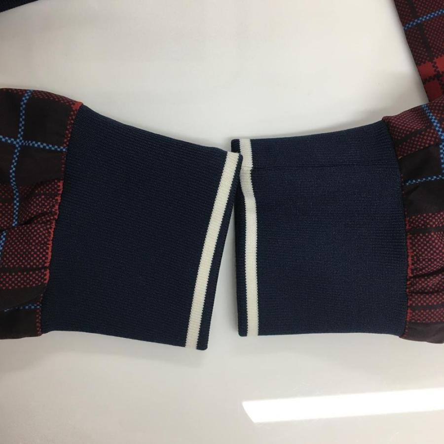 New Balance（ニューバランス） 2WAYスニード レッド×黒 チェック 裏