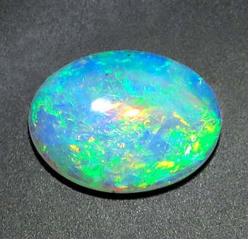 オパール 0.64ct 裸石 ルース 緑主体の遊色 オーストラリア産 瑞浪鉱物