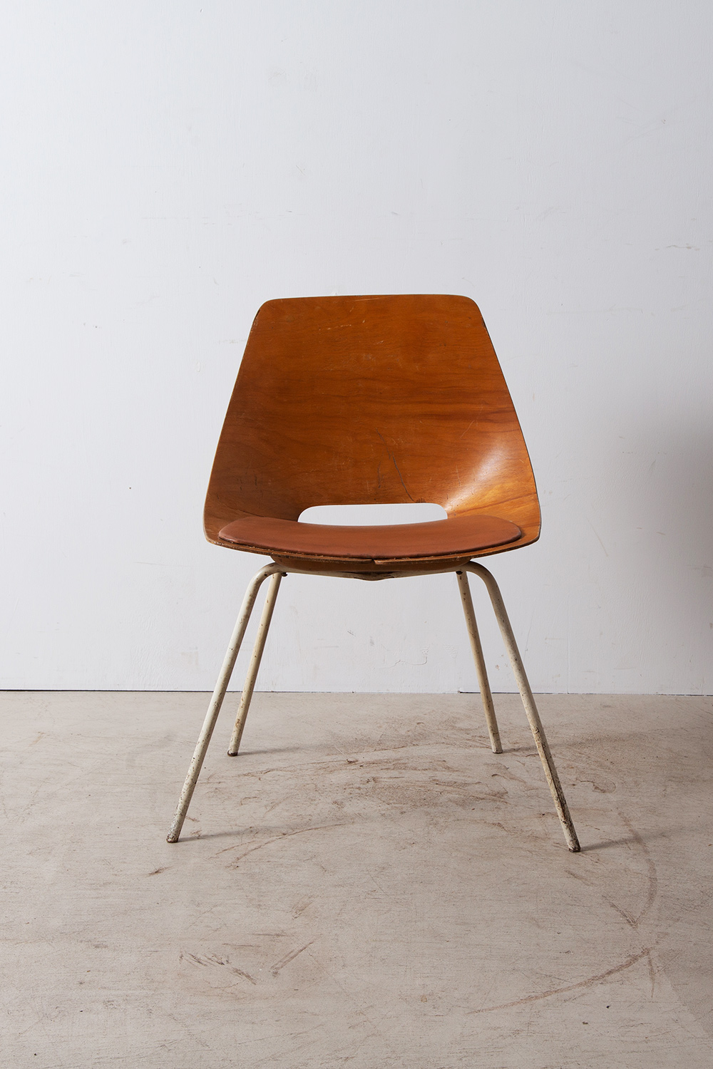 stoop | Tonneau Chair by Pierre Guariche for Steiner