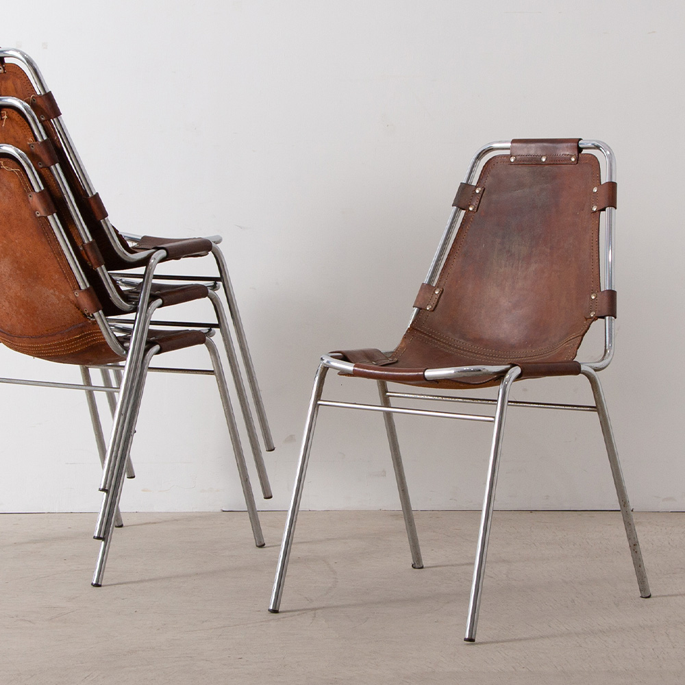 stoop | Les arcs Chair in Leather and Steel by Charlotte Perriand