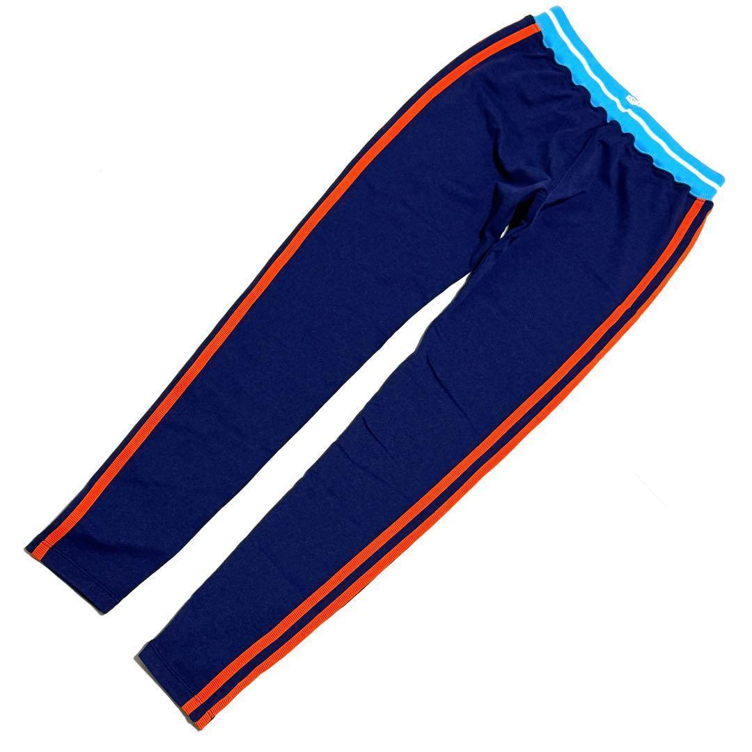 目立つロゴ良好 マークアンドロナ レディースレギンス 紺橙ライン日本