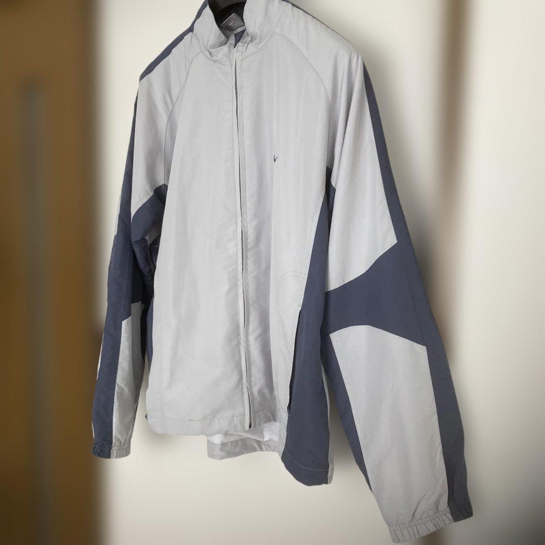 Nike ナイロンジャケット グレー/ネイビー - メルカリ