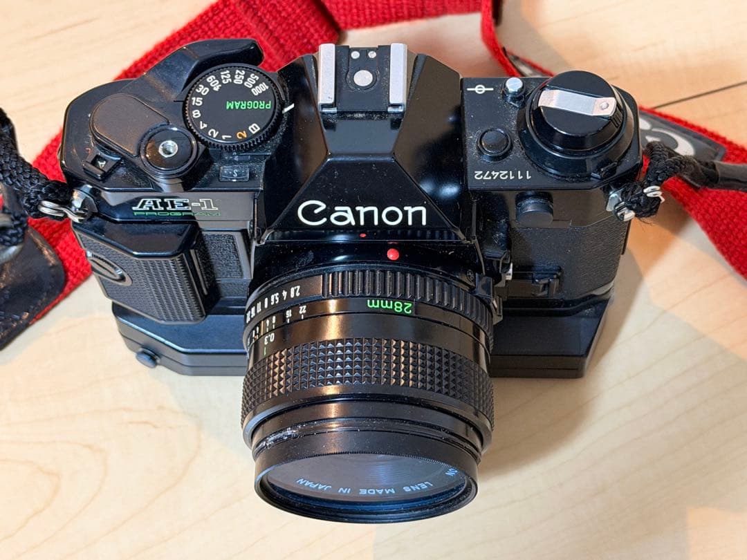 Canon AE-1 PROGRAM 一眼レフカメラ 28mmレンズ付き - メルカリ