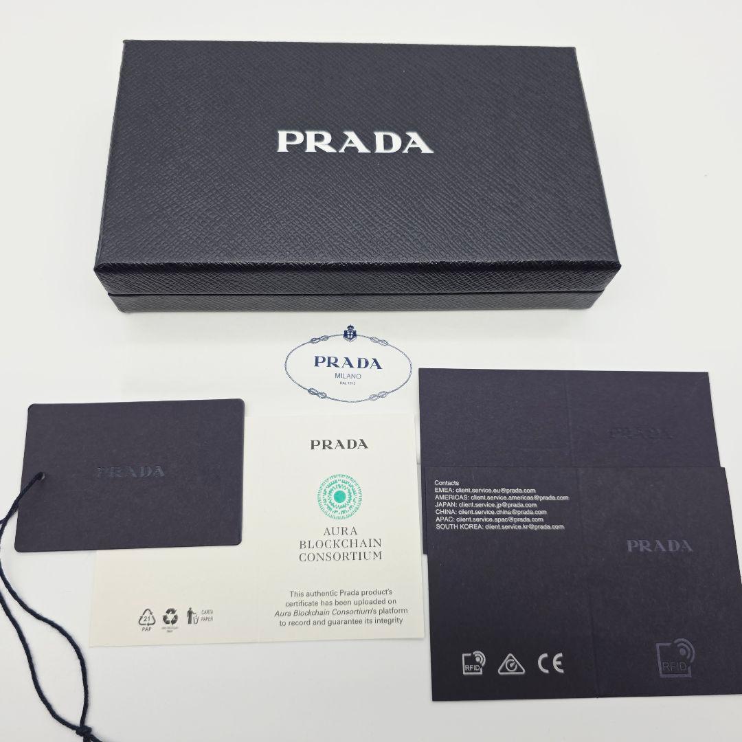 PRADA iPhone14proMAX ケース サフィアーノレザー 三角ロゴの通販はau