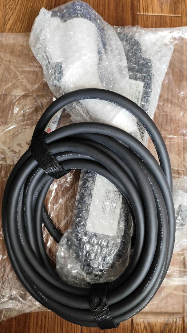 新品】日産 サクラ リーフ 純正 200v 充電ケーブル 7.5m - メルカリ