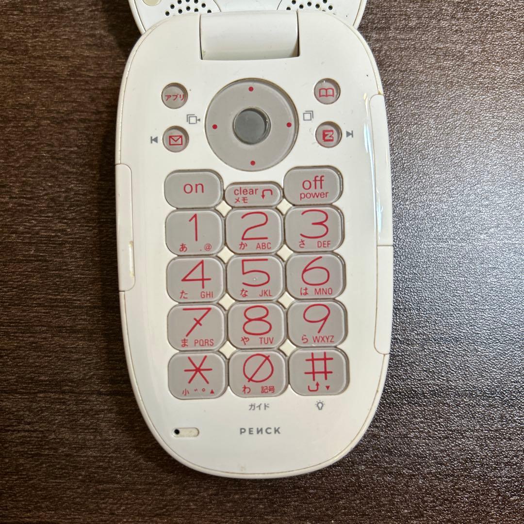 au】ガラケー penck 白 W31H サイトウマコト 箱あり - メルカリ