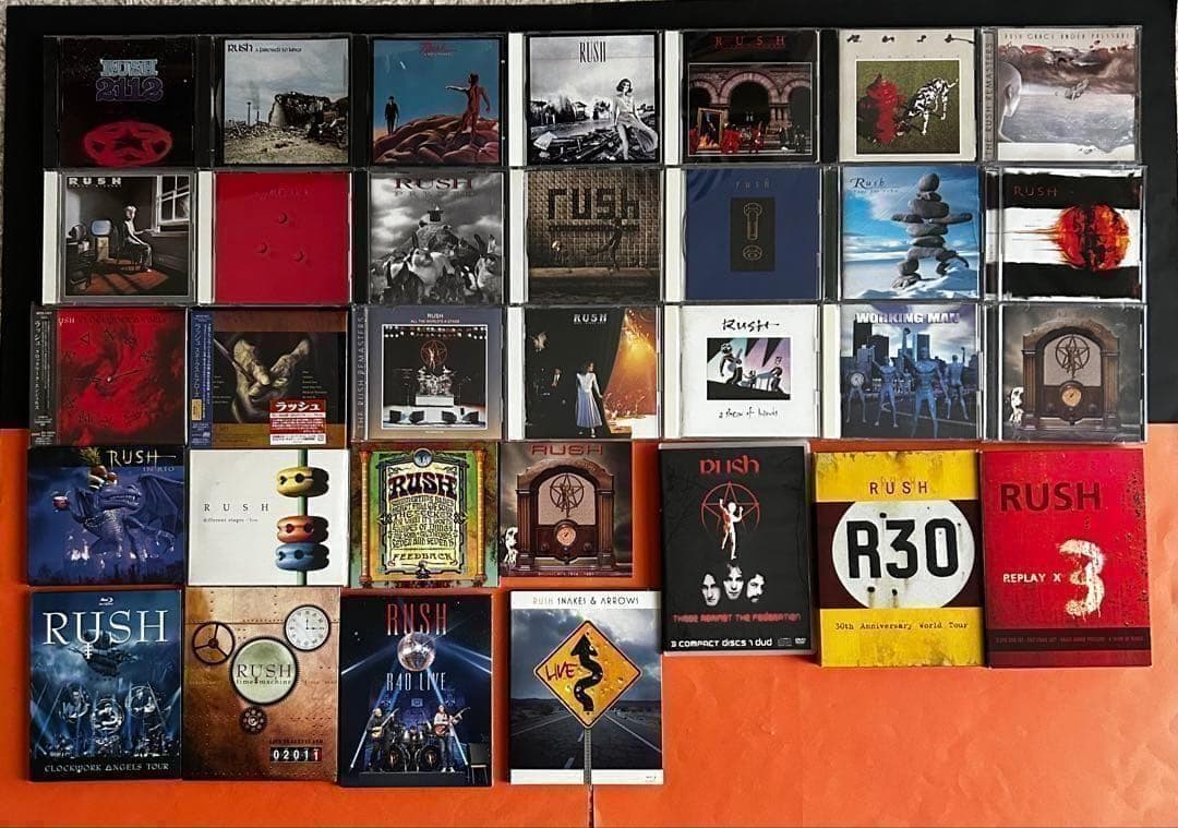 祝！50周年、そして復活　RUSH大全　 コレクション　ツアーパンフレット付 Clock over ORQUESTA 華やぐ街の礼装 ラッフルくじ＜SideB＞ | RAFFLE